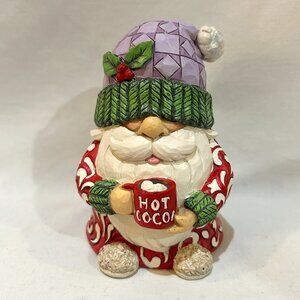Festive Santa Figurine with Red and Green Accents